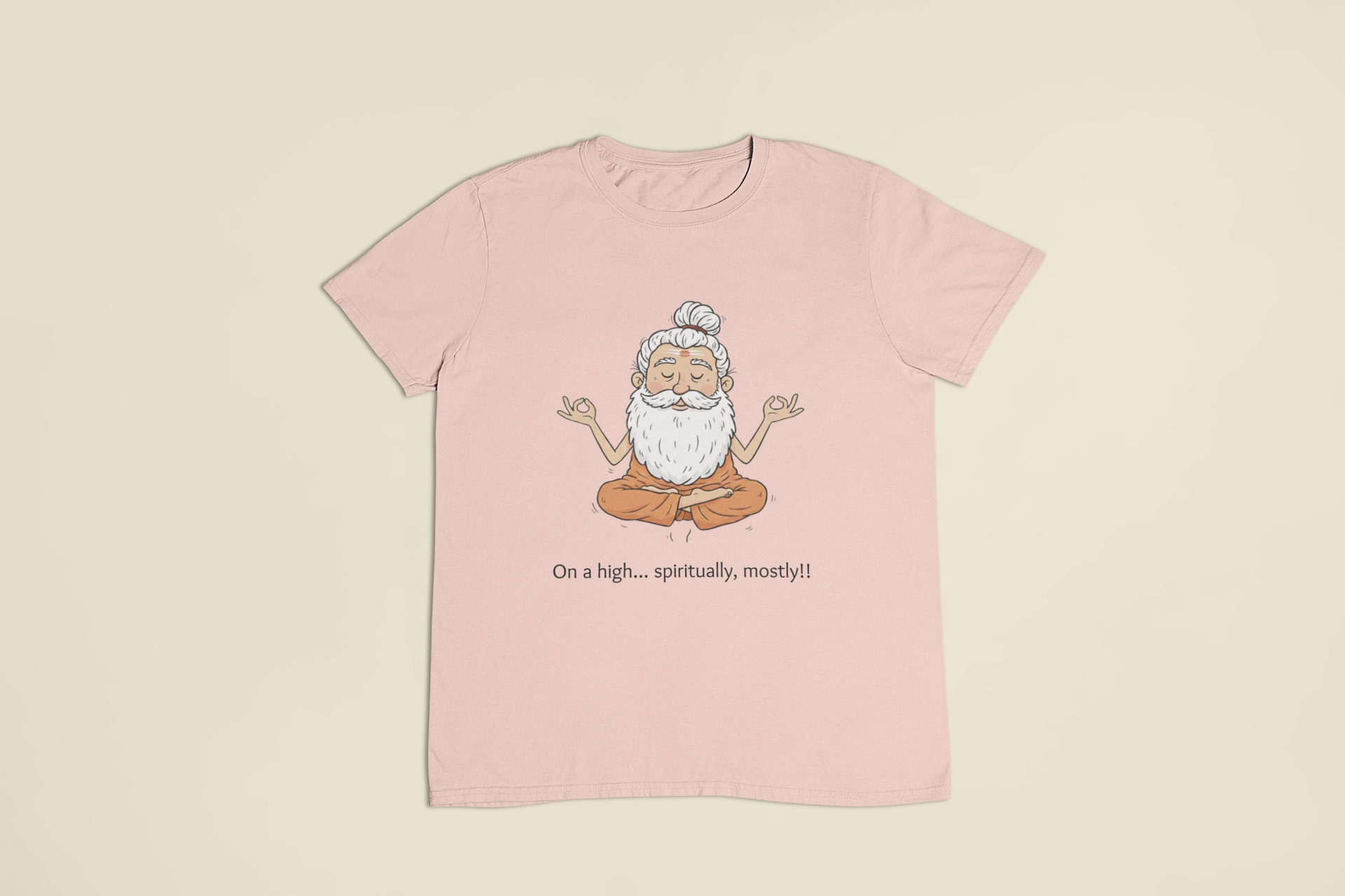 Pink t-shirt with a cartoon character and text on a beige background