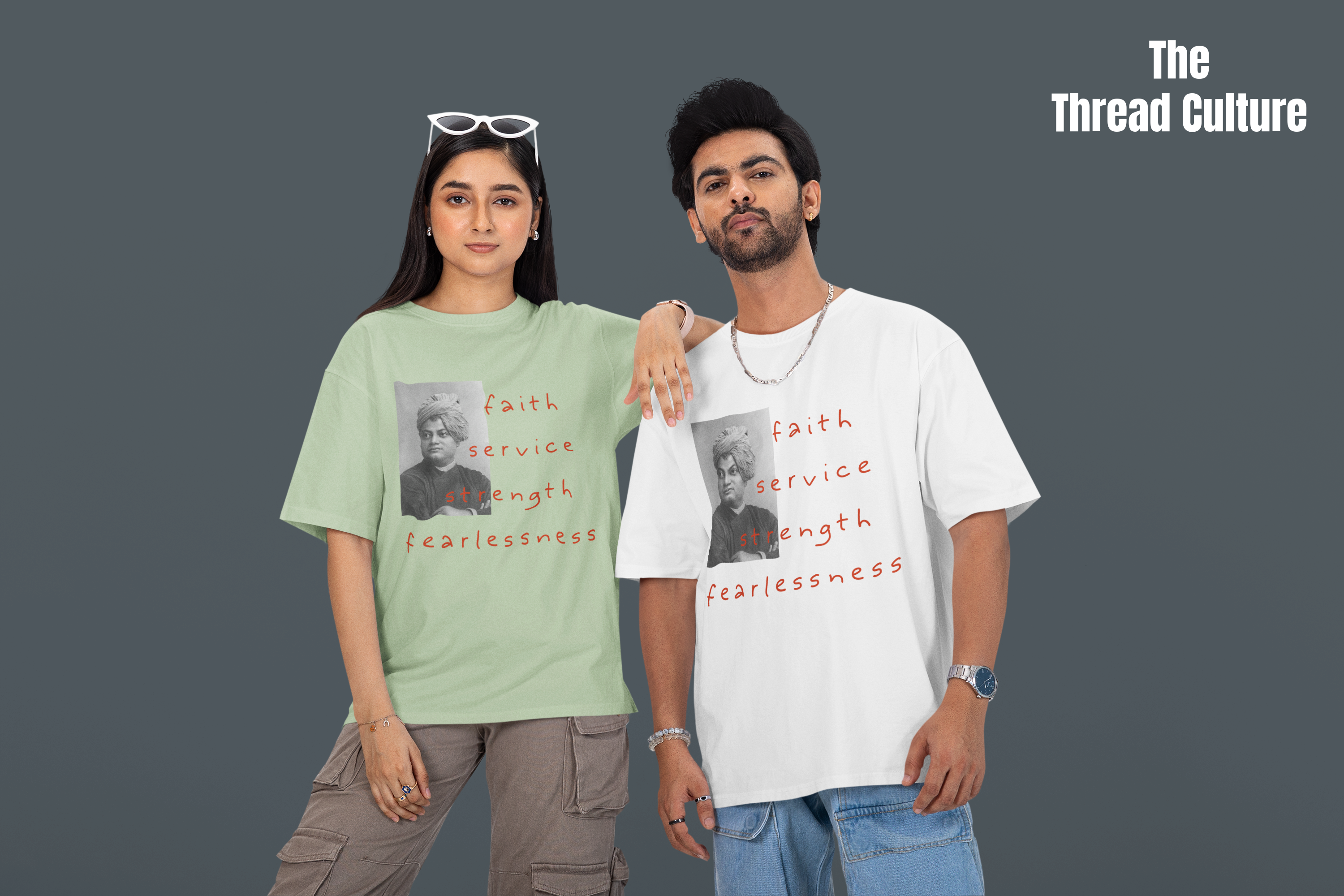 Two people wearing t-shirts with printed Vivekananda Design and text, standing against a plain background.